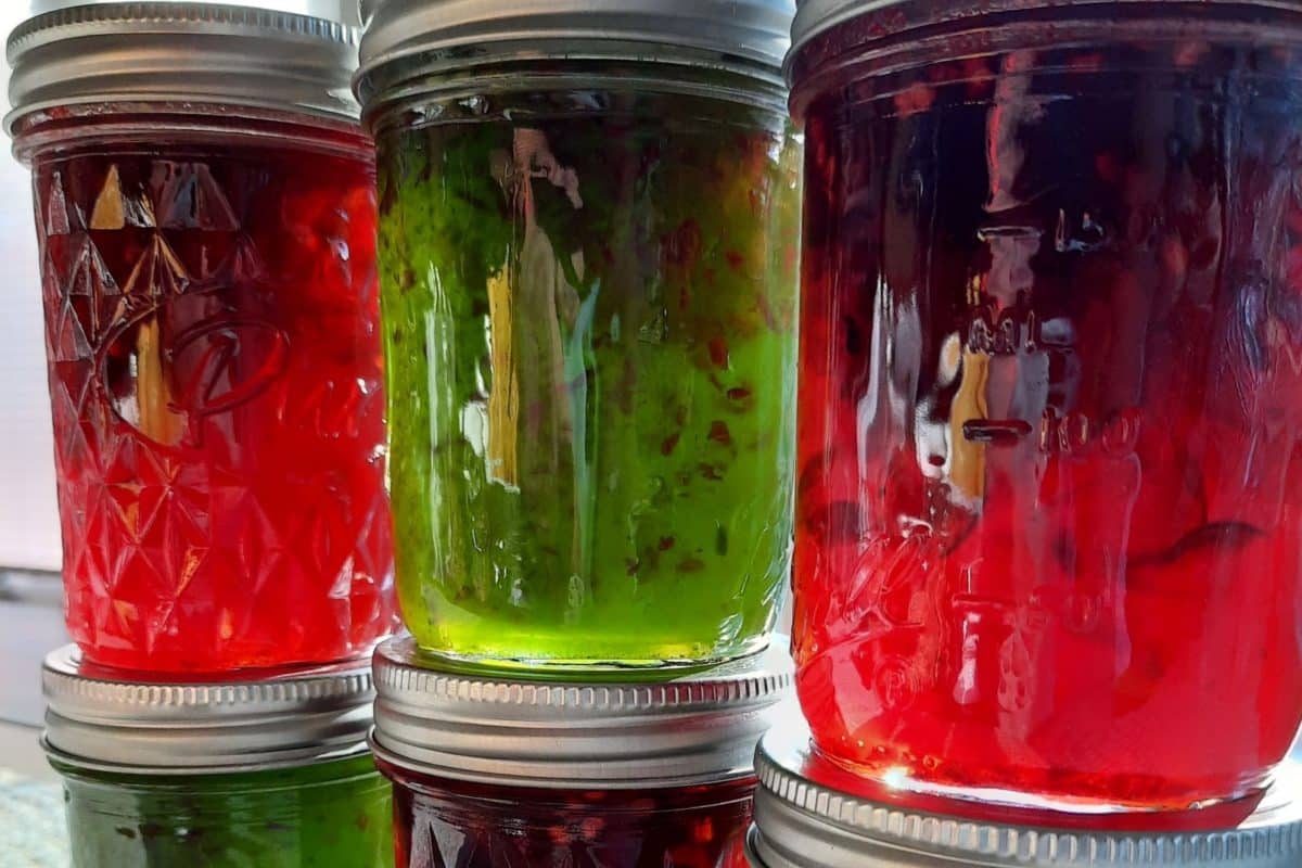Jars of vibrant Christmas pepper jam