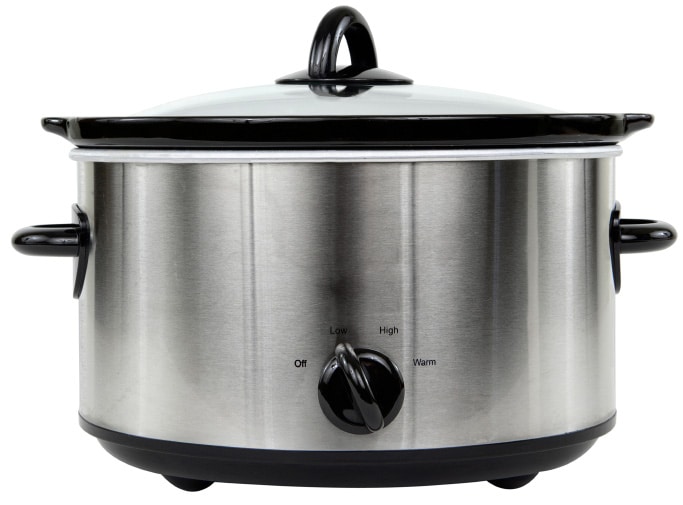 A stainless steel crockpot with black handles and a black lid.