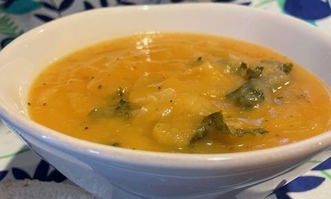 Creamy turnip soup in a white bowl
