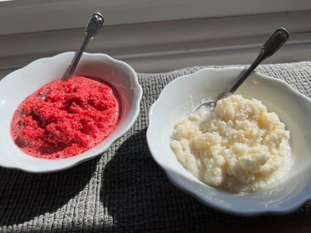 Bowls of ground and whole horseradish.