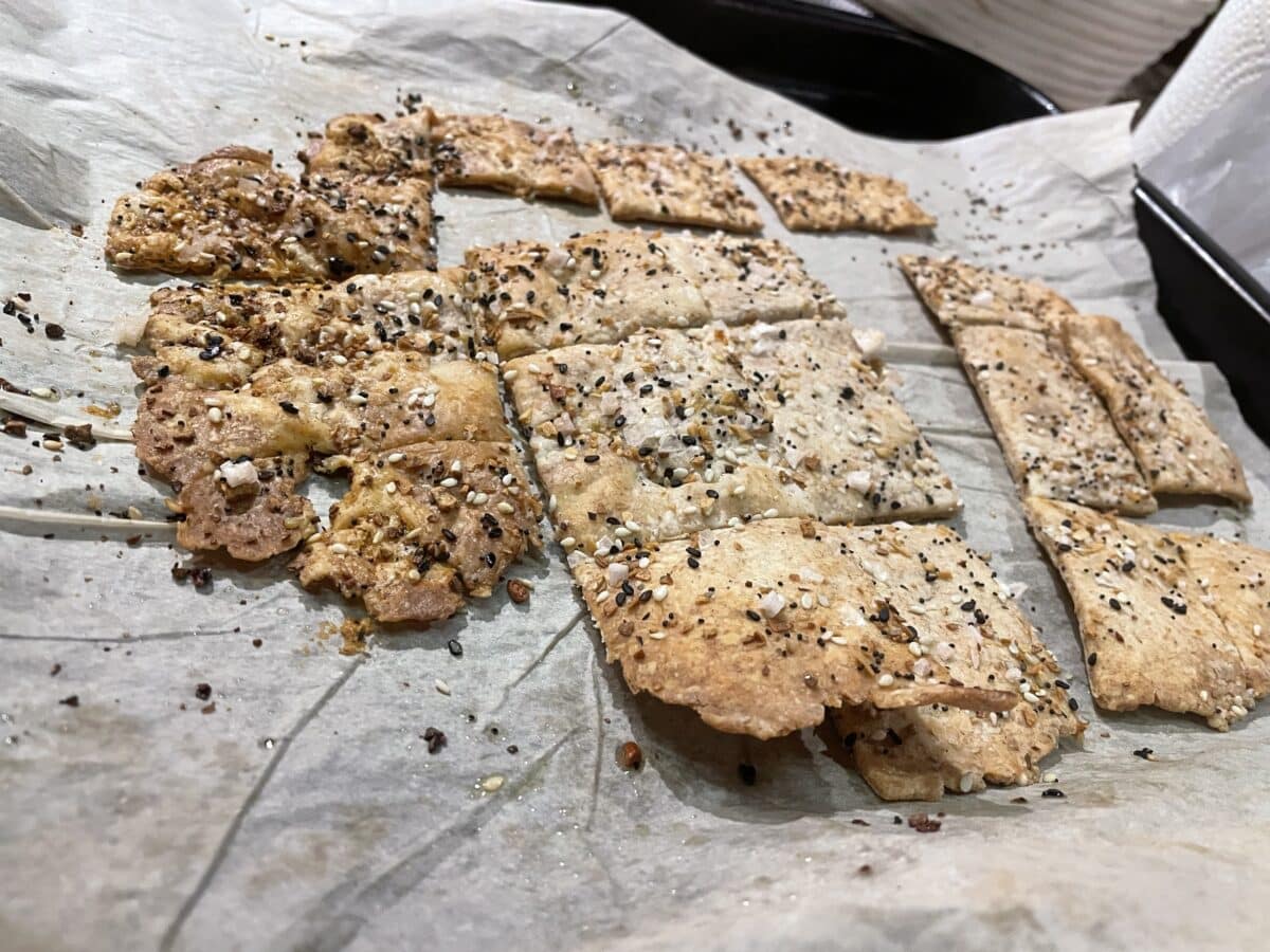 Homemade sourdough crackers on parchment