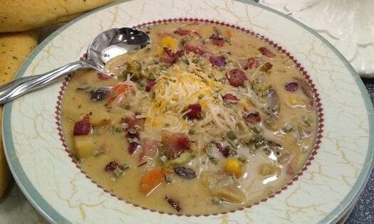 Loaded roasted potato and broccoli cheddar chowder in a bowl