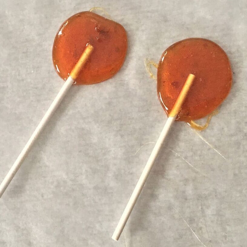 Two Lollihops showcasing their rich amber hue and unique texture.