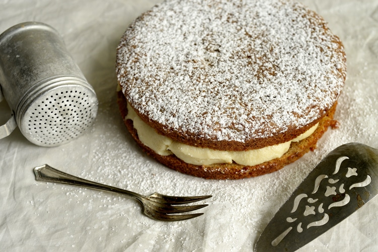 Decadent parsnip cake with a sprinkle of powdered sugar on top.