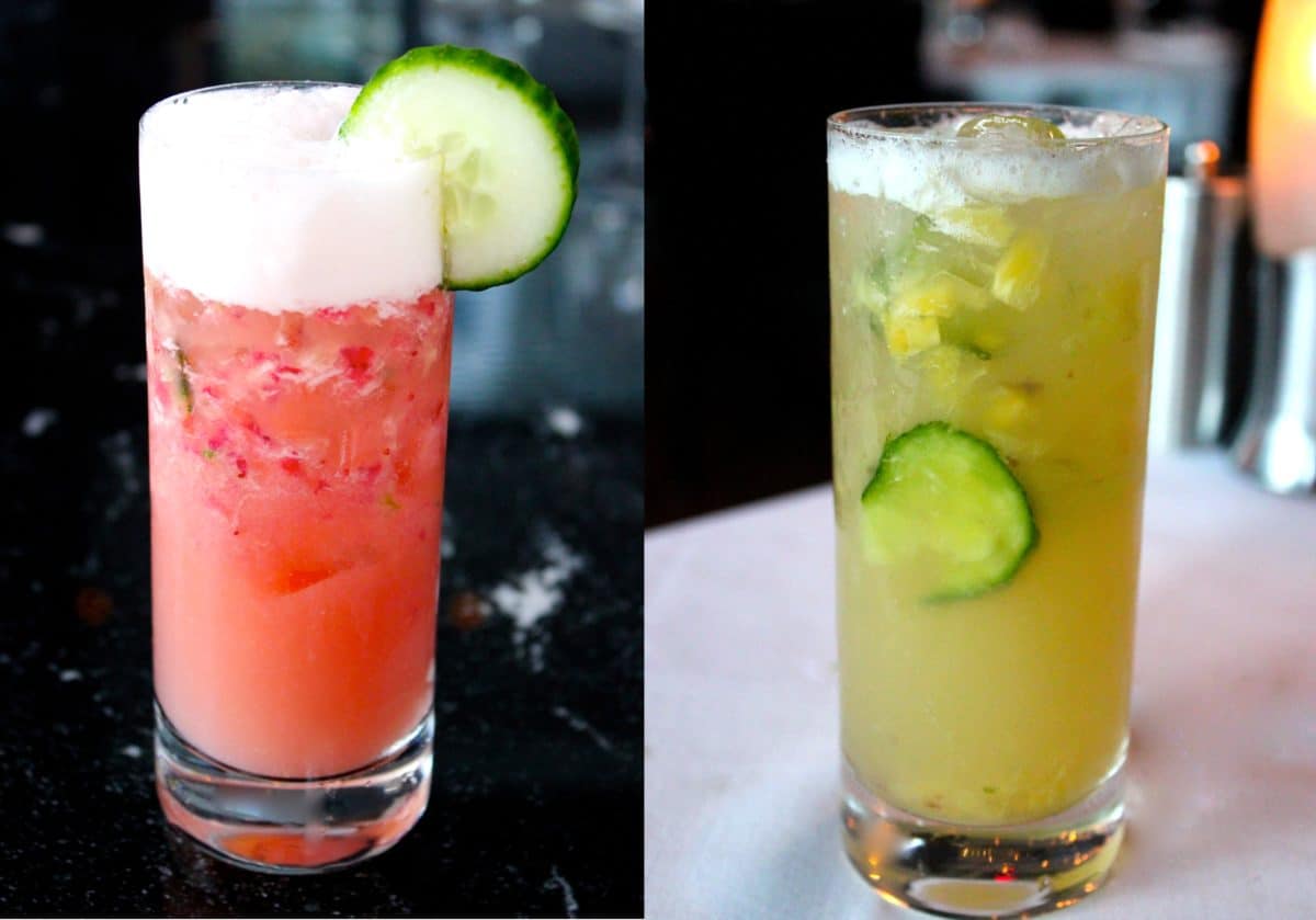 Two refreshing highball glasses of cocktails, one pink and one yellow, garnished with cucumber slices.