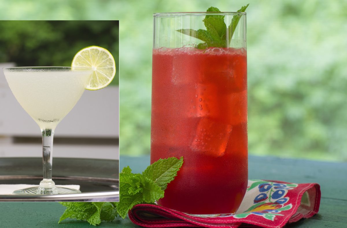 Two distinct summer drinks in glasses, one clear with a lime slice and the other red with fresh mint.