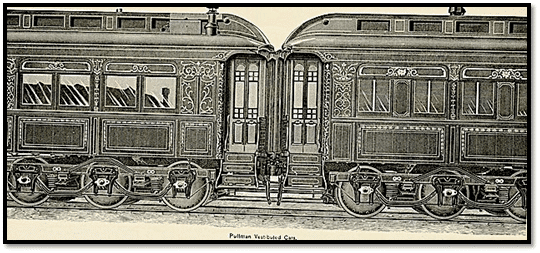 Close-up view of a whole Pullman loaf on a wire rack with a kitchen background.